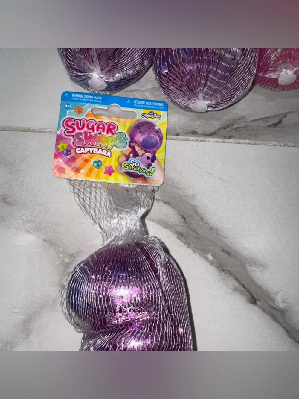 Sugar swaps Glitter Squishes capybaras  - Blue, Purple & Pink Sensory Toy